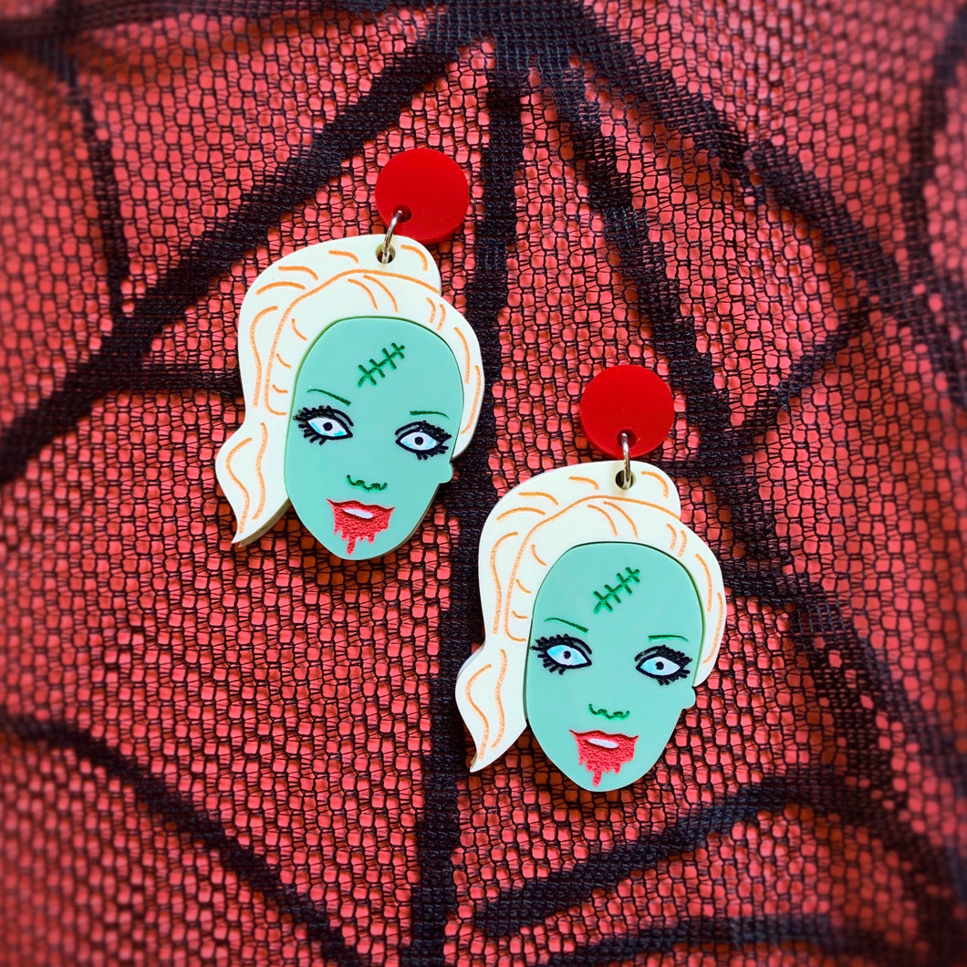 zombie barbie earrings